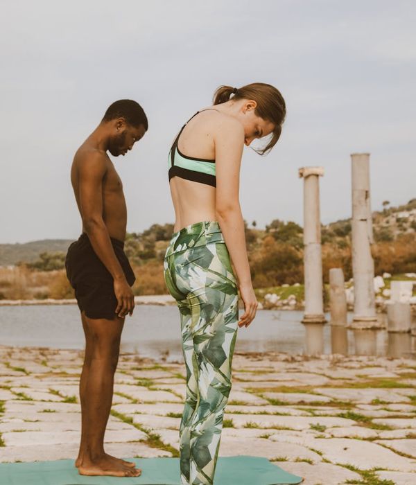 Man performing a controlled strength exercise in a calm environment.